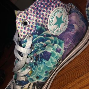 purple, green, and blue floral converse